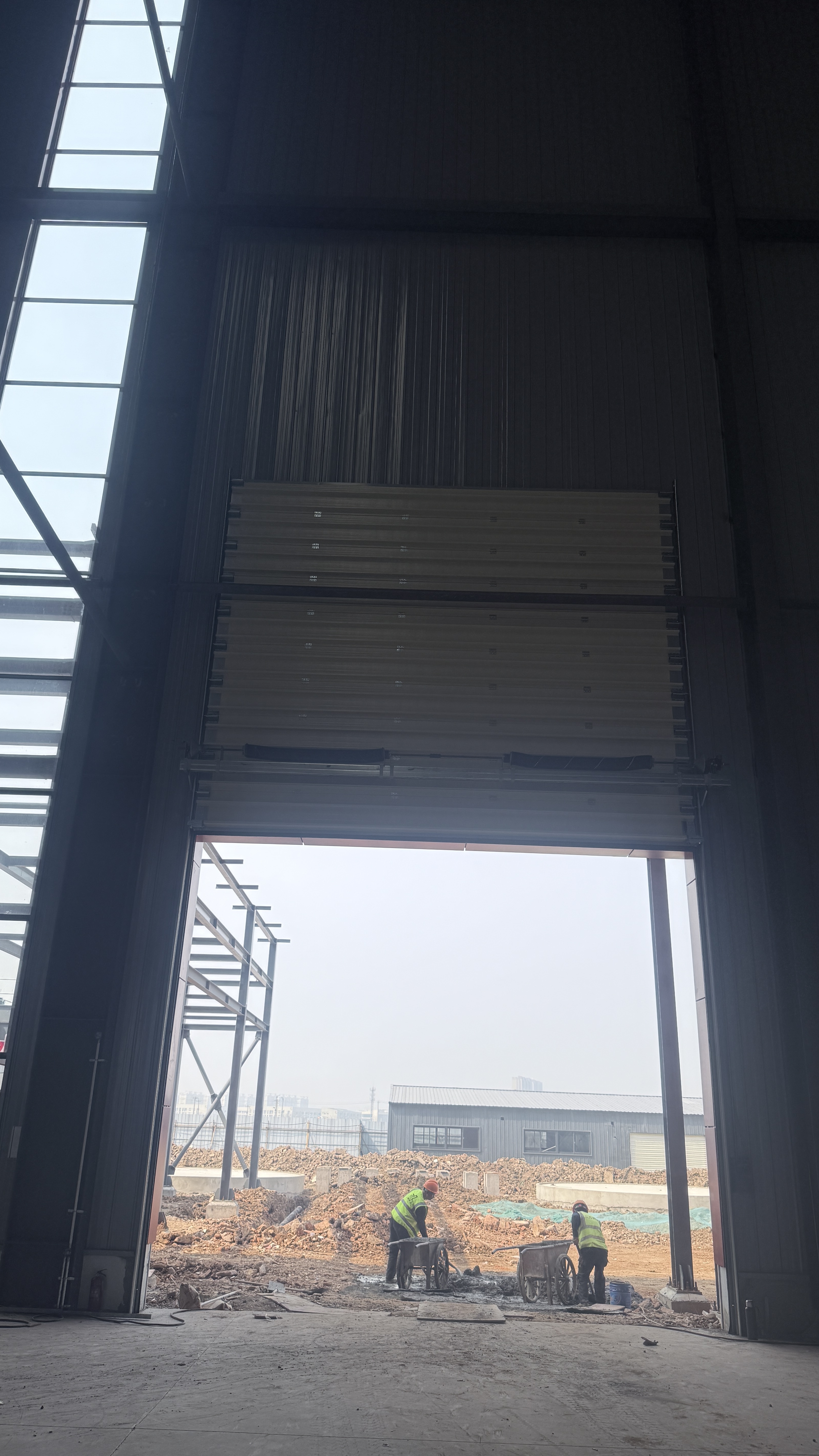 停车场防火卷帘门进户门价格，启功高安全反恐型升降柱现货