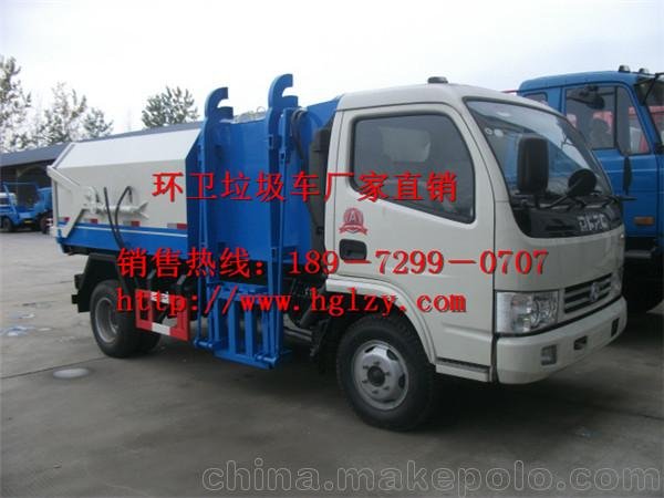 帶掛桶的壓縮垃圾車圖片