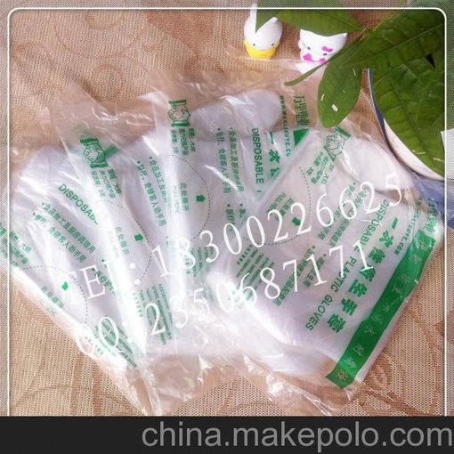 莒縣一次性手套.0.5g一次性pe手套.美容美發(fā)食品專用薄膜手套圖片