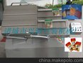 兴源牌倾斜式滚动式真空包装机